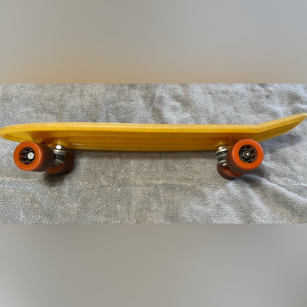 Huffy 24”  Thunder Board  Actiontail skateboard